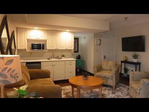 Cozy living area in a senior care facility room