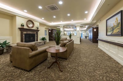 Common area with seating and fireplace