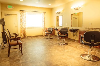 Beauty salon interior with chairs and mirrors