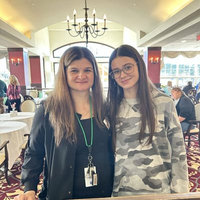 Staff member with a resident in a common area