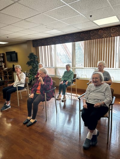 Group of seniors sitting in a common area