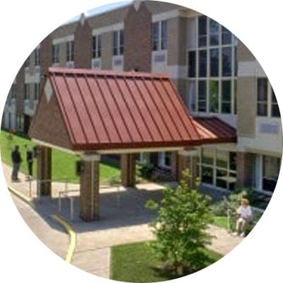 Entrance with covered area and seating