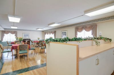Interior view of a common area with tables and chairs
