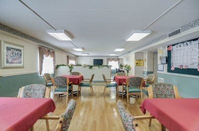 Dining area with tables and chairs in a common space