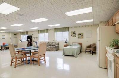 Bright common area with seating and games