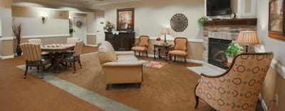 Comfortable common area with seating and games