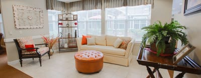 Bright and welcoming common area with seating and decor