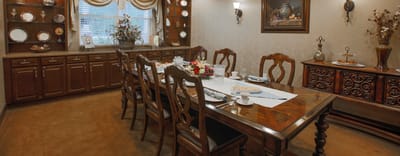 Dining room set up for a meal with elegant decor