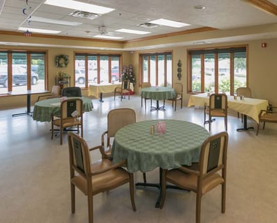 Bright dining area with tables set for meals