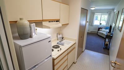 View of a studio apartment with kitchenette