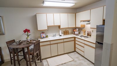 A cozy kitchen area in a resident's suite
