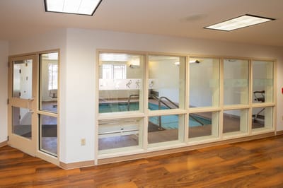 Indoor pool area with large windows