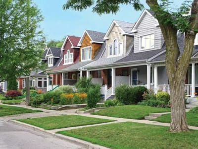Row of houses with green landscaping
