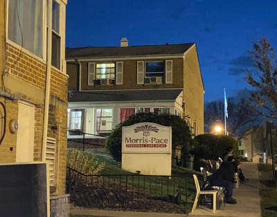 Exterior view of Morris-Pace Personal Care Home at dusk