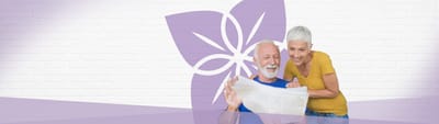 Happy seniors enjoying time together with a white background