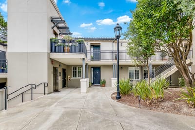 Exterior view of a senior living facility entrance.