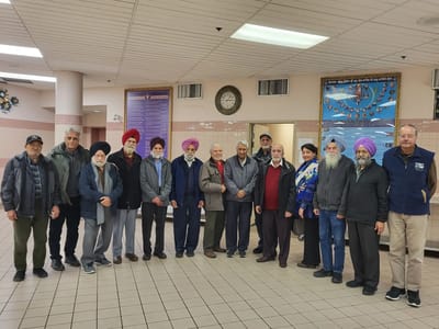Group of seniors posing in a common area