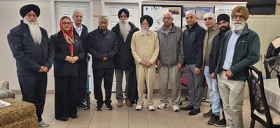 Residents and staff gathered in a common area