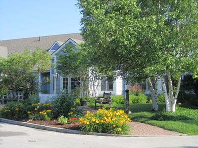 Exterior view of a building with landscaped gardens