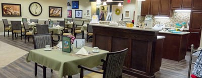 Dining area with tables set for a meal