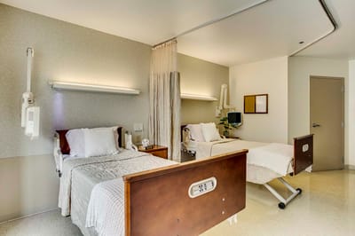 A twin bedroom in a senior care facility