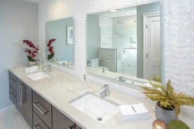 Modern bathroom interior with bright decor and mirrors