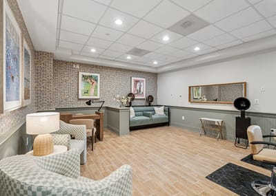 Bright common area with seating and artwork