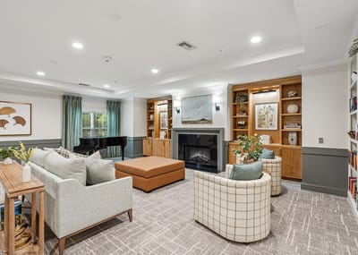 Interior common area with seating and piano
