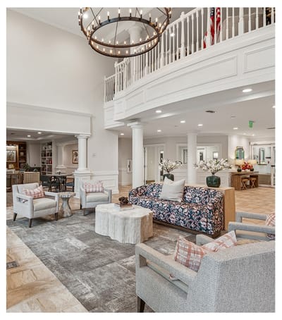 Bright and inviting common area with floral decorations