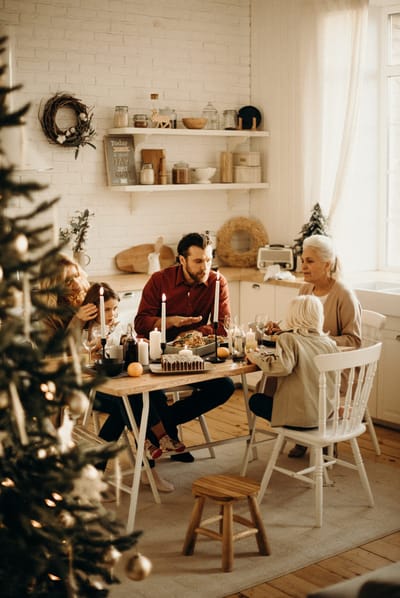 Family gathering around a dining table