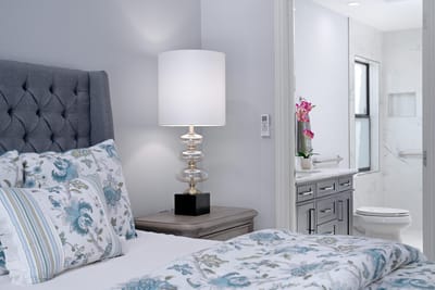 Cozy bedroom with floral bedding and modern decor