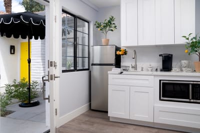 Modern kitchen area with outdoor access