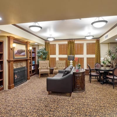 Cozy lounge area with comfortable seating and fireplace