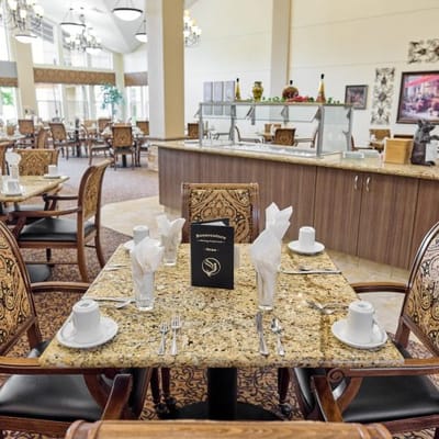 Dining area set up for a meal service in a senior living facility