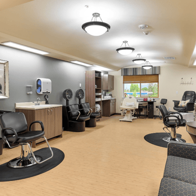 Interior view of a beauty salon with styling chairs