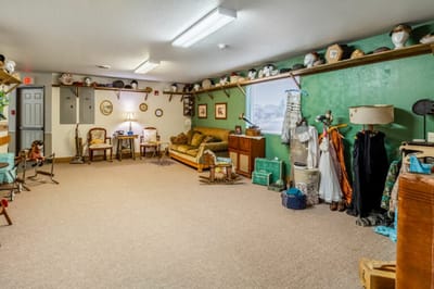 Brightly lit common area with seating and decor