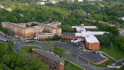 Aerial view of Forest View Senior Living facility surrounded by greenery.