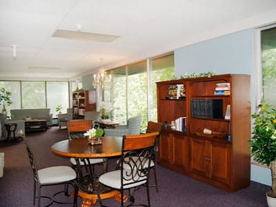 Common area with seating and natural light