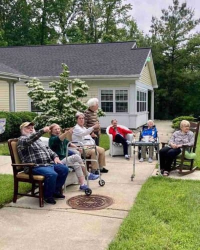 Residents enjoying the outdoors in a garden area