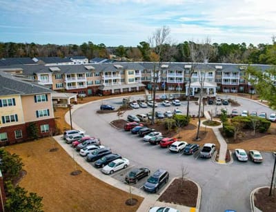 Aerial view of the parking area and building exterior