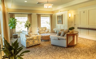 Bright common area with comfortable seating and natural light