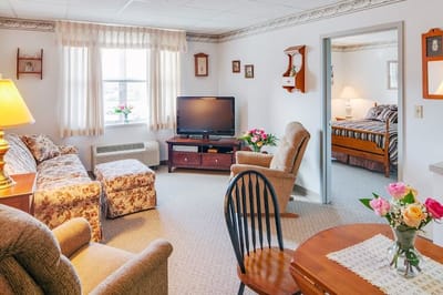 Cozy interior of a resident room with furniture