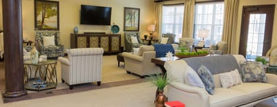 Bright common area with comfortable seating and decor
