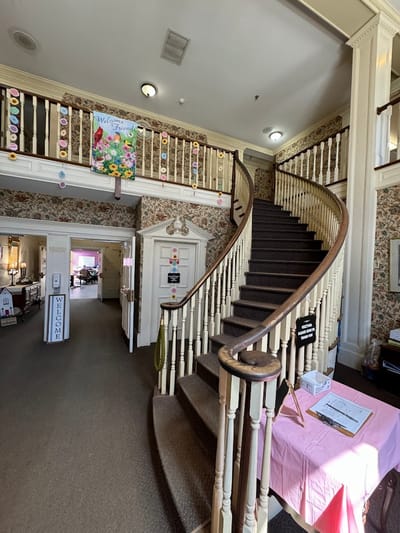 Interior view of a staircase in a senior living facility