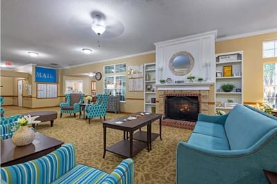 Common area with seating and a fireplace