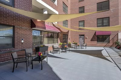 Patio area with chairs and flowers