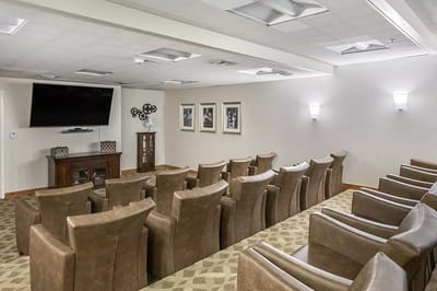 Interior common area with seating and a television