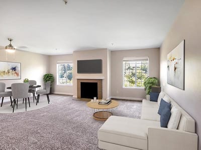 Bright interior living area with seating and dining space