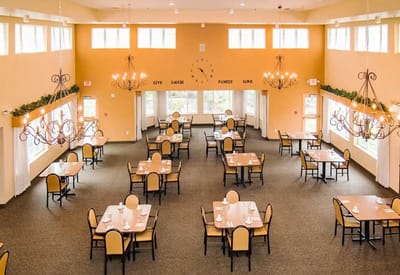 Dining room with tables and chandeliers