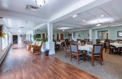 Interior view of a dining area with tables and chairs